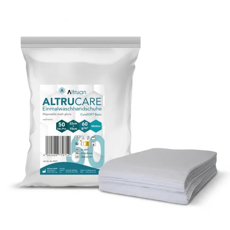 Eine Packung Altruan Altrucare Einmalwaschhandschuhe CuraSOFT Basic (60g) mit 50 Handschuhen wird neben einem Stapel ungefalteter Handschuhe gezeigt. Die Verpackung zeigt, dass jeder Handschuh 22 cm x 15 cm groß ist.