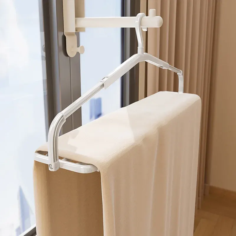 Fold Away Extendable Laundry Hanger Rack - Image 0